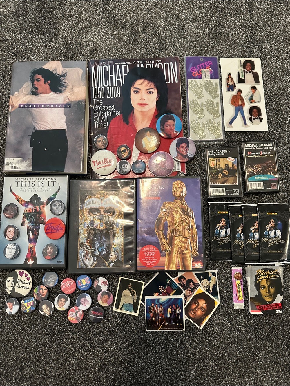 Michael Jackson book, stickers, buttons, magazine, tapes, movies